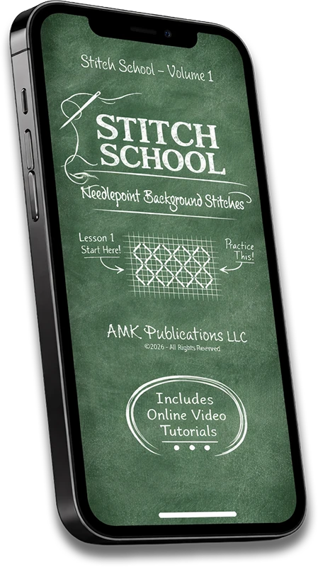 A Stitch School video lesson open on a phone screen, showing how the online needlepoint guides pair each chart with a video